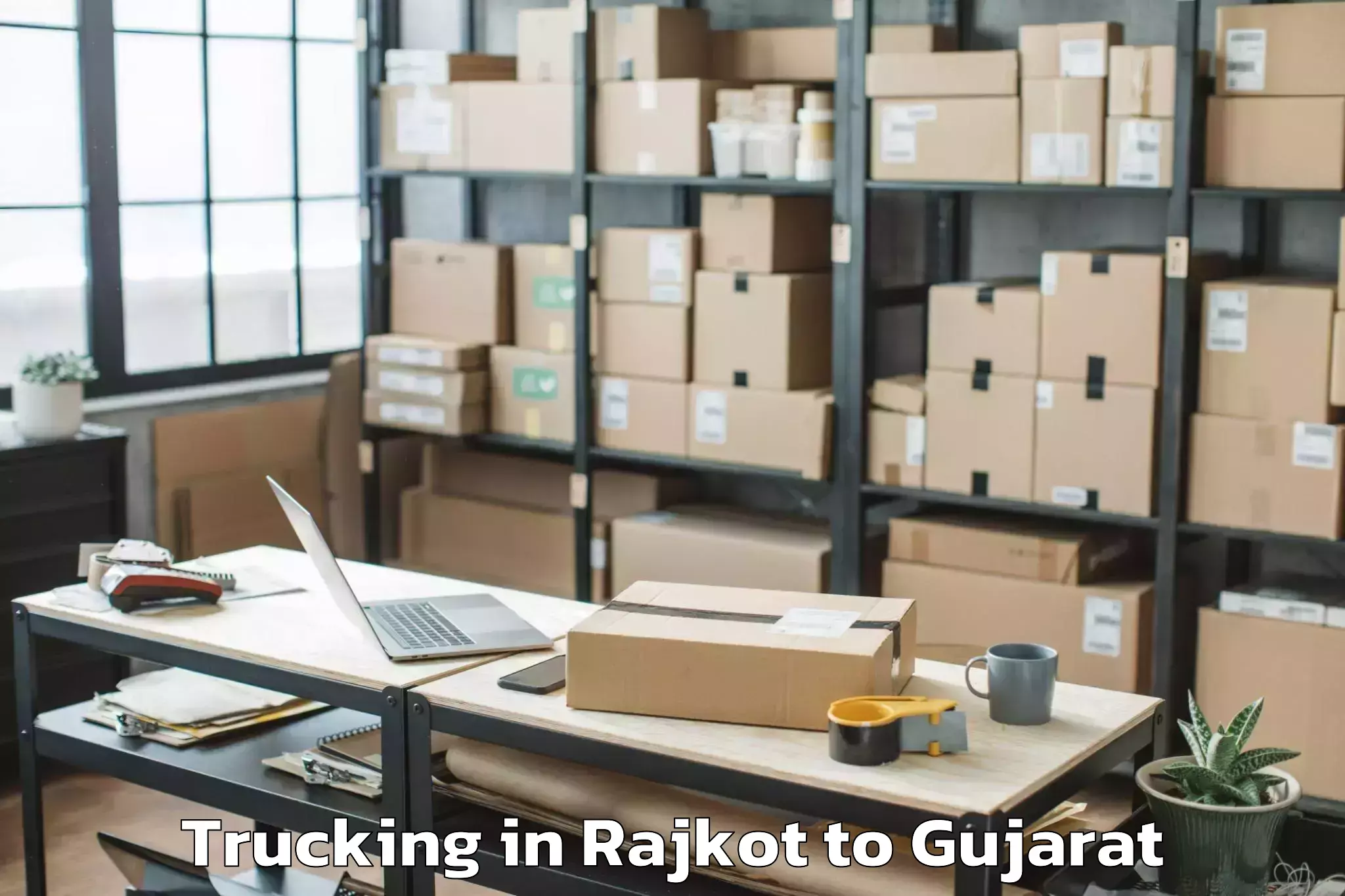 Professional Rajkot to Adalaj Trucking